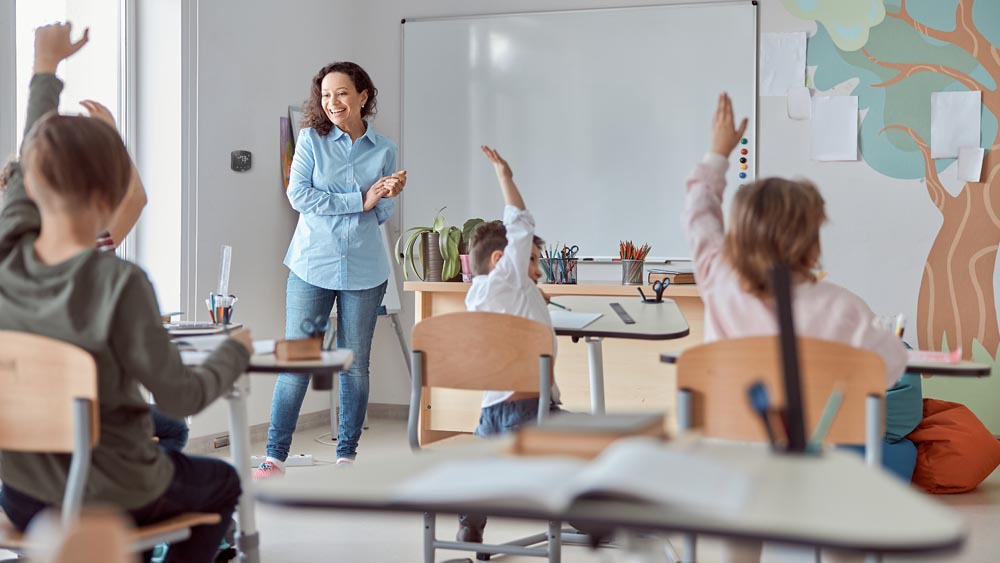 Teacher having a discussion in a classroom