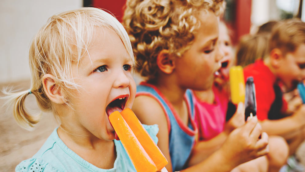 A child eating Popsicle