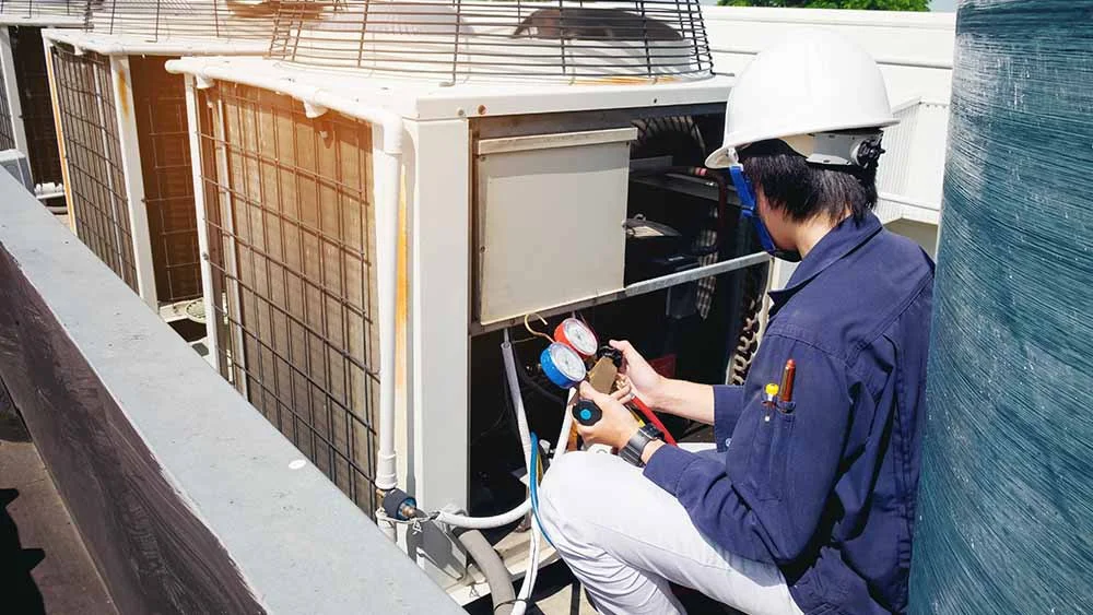 HVAC technician doing an HVAC inspection