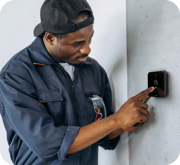 HVAC professional checking settings after successful installation of Cielo Breez Edge