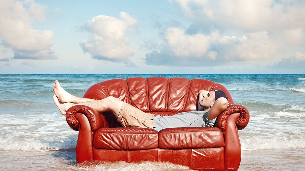 Man relaxing on a sofa