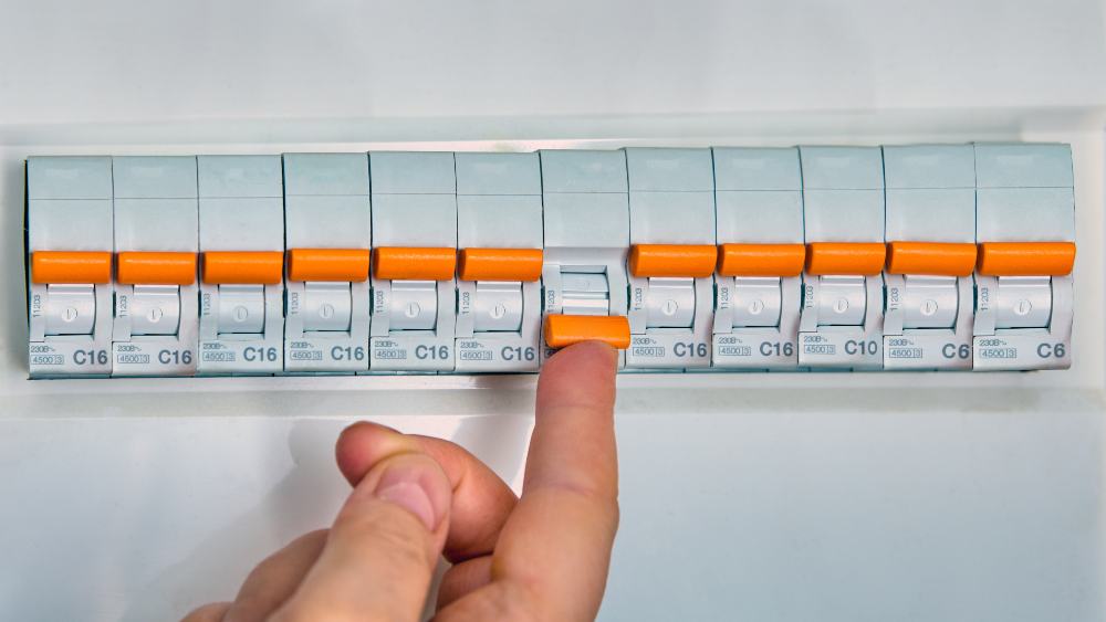 man using circuit breaker