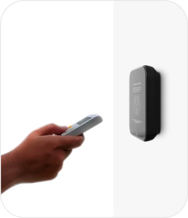 A person pointing a remote at Breez Edge