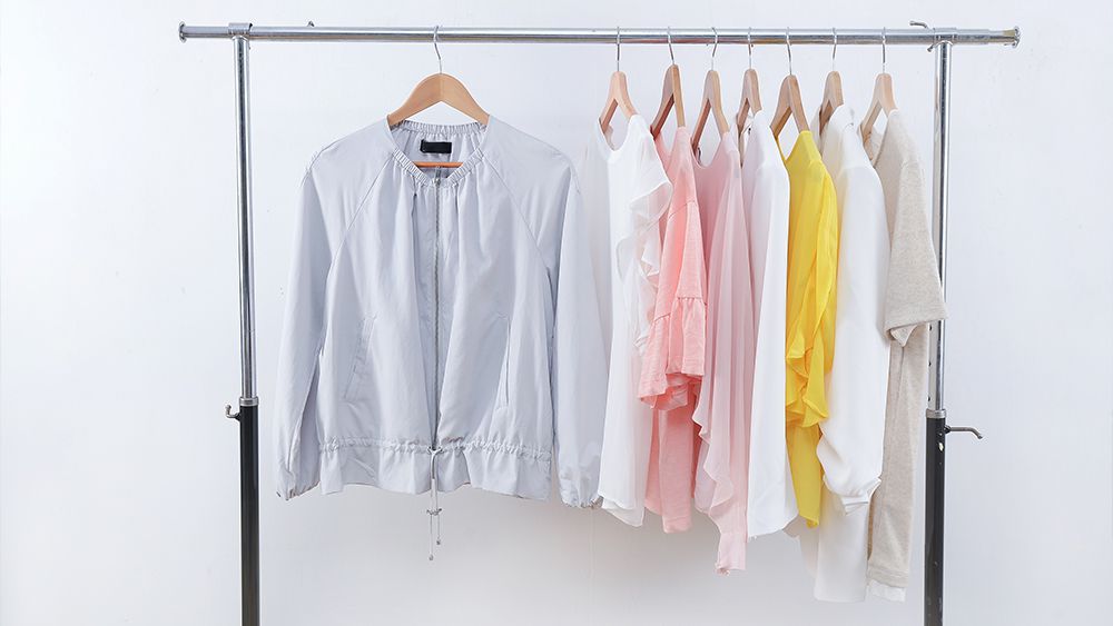 Summer closet consisting of light colored clothes
