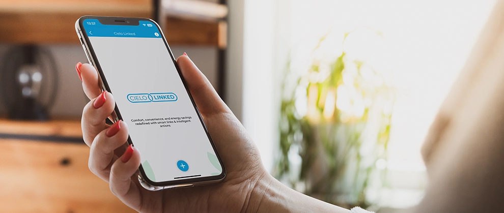 Woman using cielo linked on her phone