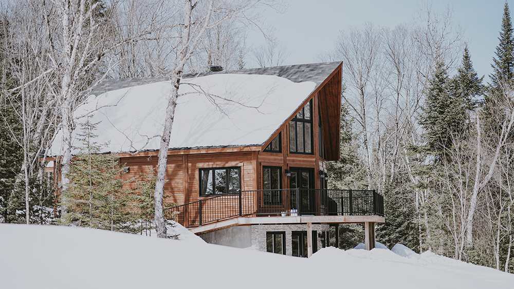 A house covered in snow in winter season