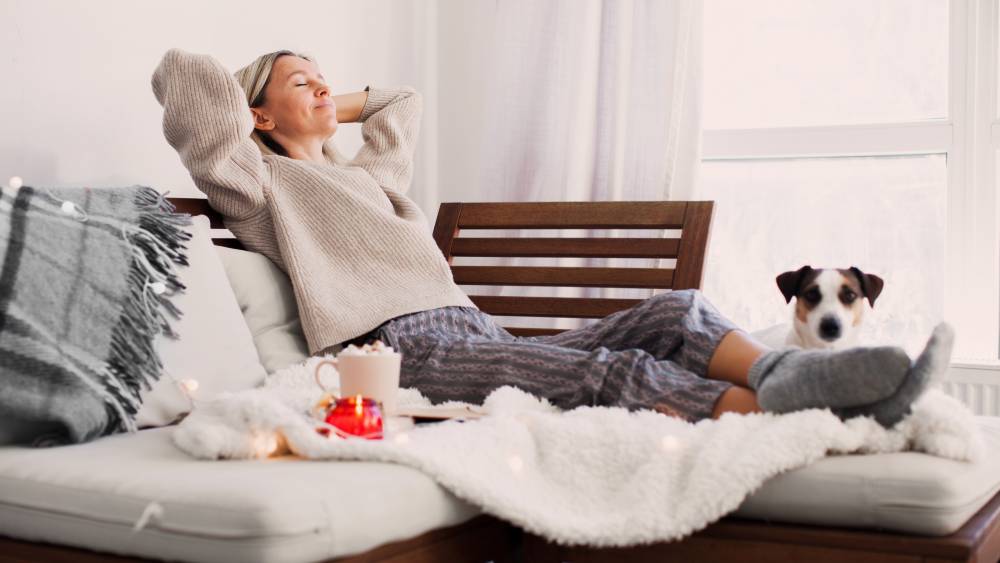 woman relaxing in her home