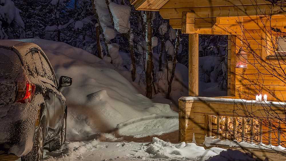 Huge snow pile outside a house