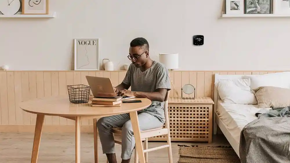 Man working in a comfortable temperature.