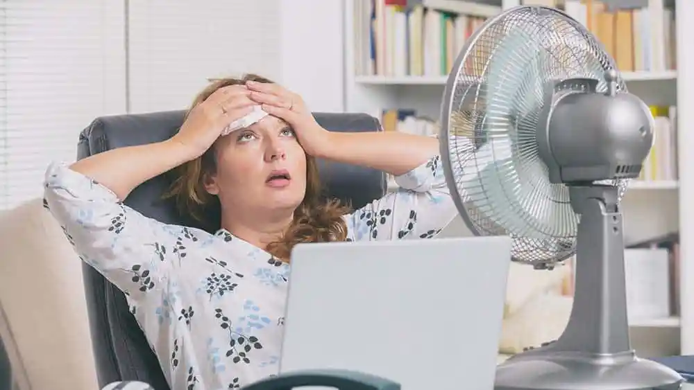 Woman annoyed because of poor humidity level.