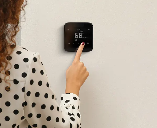 girl using breez max black on device controls